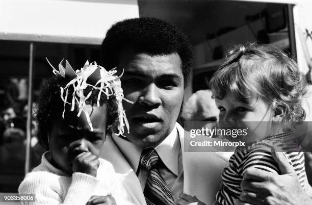World heavyweight boxing champion Muhammad Ali presented a sunshine coach on the behalf of the Variety club of Great Britain, the children's charity...