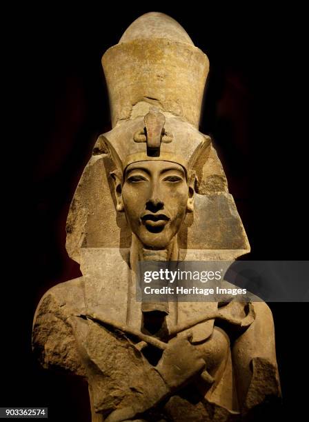 Statue of Akhenaten. Found in the Collection of The Egyptian Museum, Cairo.