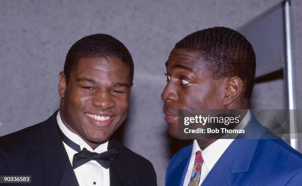 British heavyweight boxer Frank Bruno gets a close look at American heavyweight Riddick Bowe at the BBC Sports Personality of the Year Awards in...