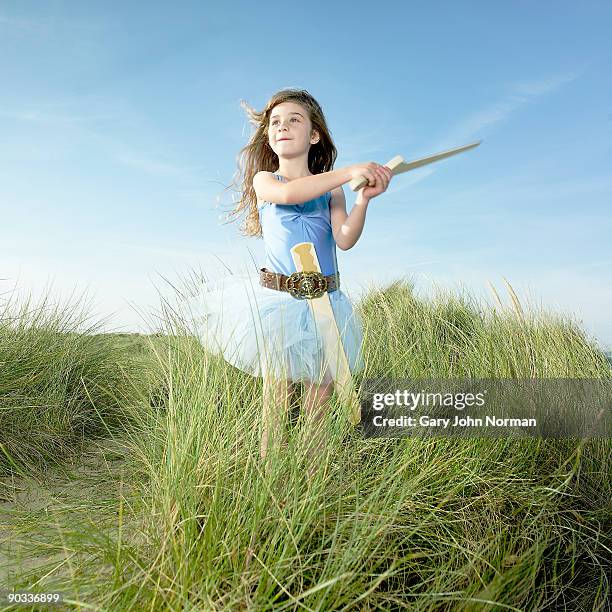 girl dressed in tutu with sword - genderblend2015 stock pictures, royalty-free photos & images