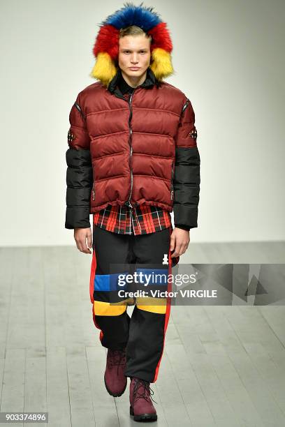 Model walks the runway at the Bobby Abley show during London Fashion Week Men's January 2018 at BFC Show Space on January 8, 2018 in London, England.