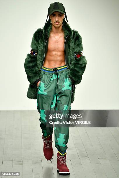 Model walks the runway at the Bobby Abley show during London Fashion Week Men's January 2018 at BFC Show Space on January 8, 2018 in London, England.