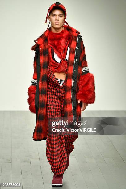 Model walks the runway at the Bobby Abley show during London Fashion Week Men's January 2018 at BFC Show Space on January 8, 2018 in London, England.