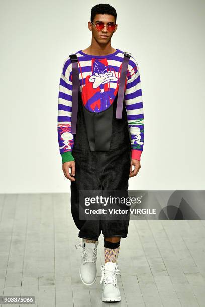 Model walks the runway at the Bobby Abley show during London Fashion Week Men's January 2018 at BFC Show Space on January 8, 2018 in London, England.