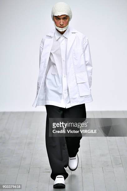 Model walks the runway at the PRONOUNCE Presented By GQ CHINA show during London Fashion Week Men's January 2018 at BFC Show Space on January 8, 2018...