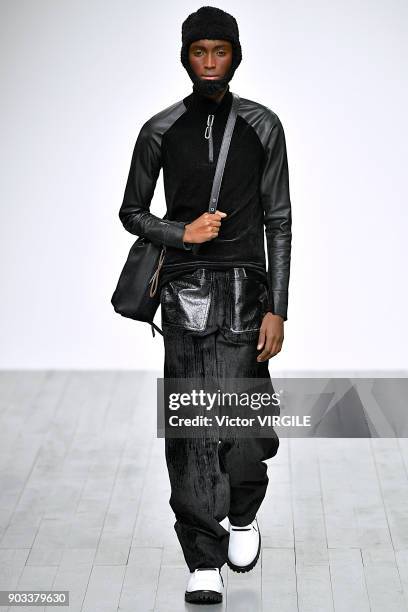 Model walks the runway at the PRONOUNCE Presented By GQ CHINA show during London Fashion Week Men's January 2018 at BFC Show Space on January 8, 2018...