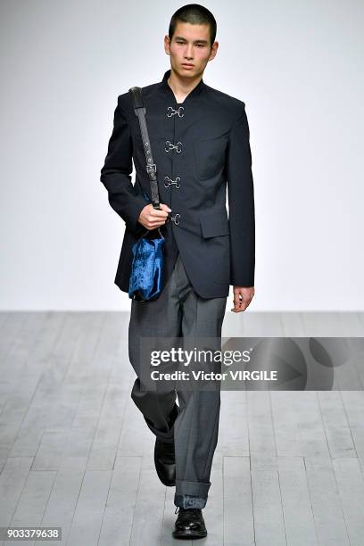 Model walks the runway at the PRONOUNCE Presented By GQ CHINA show during London Fashion Week Men's January 2018 at BFC Show Space on January 8, 2018...