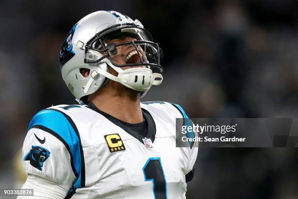 Cam Newton of the Carolina Panthers warms up prior to playing the New Orleans Saints during the NFC Wild Card playoff game at the Mercedes-Benz...