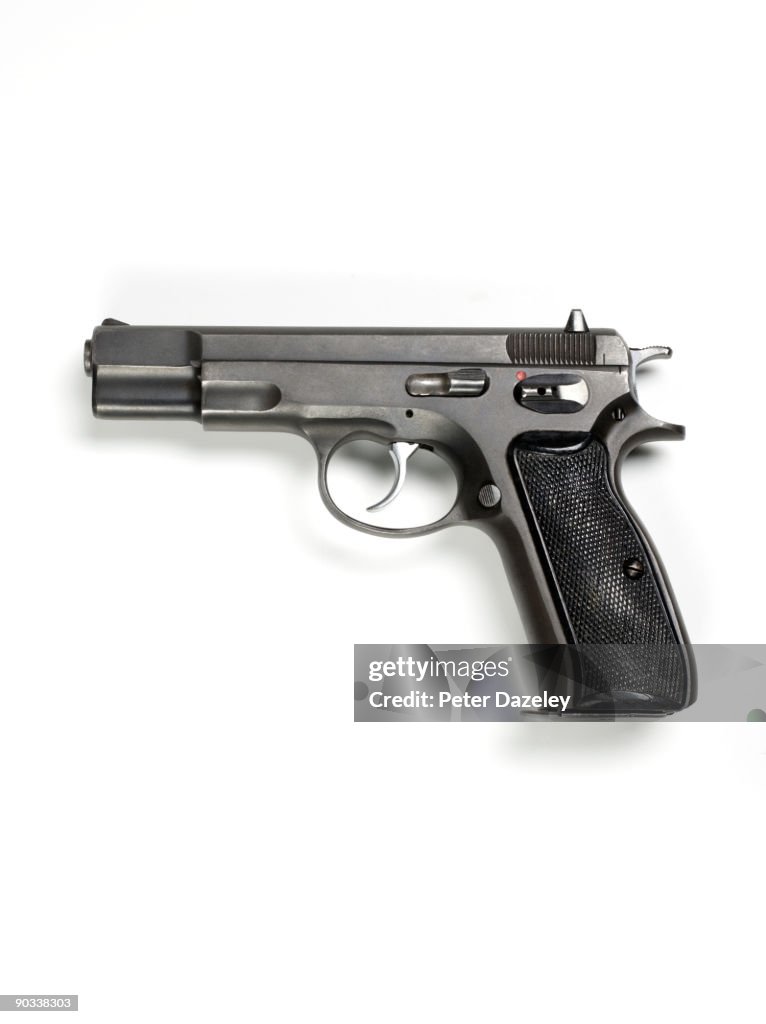 9mm hand gun on white background.