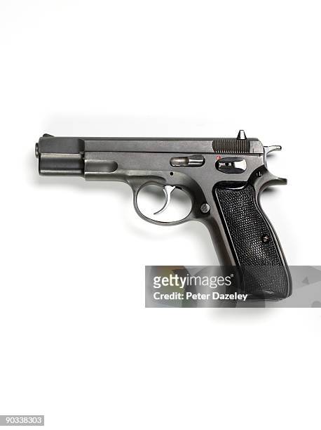 9mm hand gun on white background. - pistol stock pictures, royalty-free photos & images