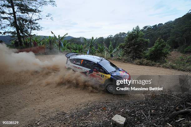 Sebastien Loeb of France and Daniel Elena of Monaco compete in their Citroen C4 Total during day one of the Repco Rally of Australia on September 4...