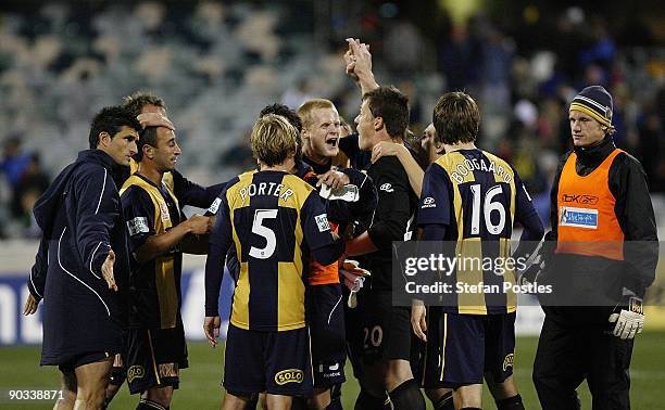 Mariners players celebrate after winning the round five A-League match between the Central Coast Mariners ans the Perth Glory at Canberra Stadium on...