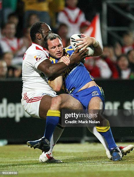 Wendell Sailor of the Dragons tackles Luke Burt of the Eels in goal during the round 26 NRL match between the St George Illawarra Dragons and the...