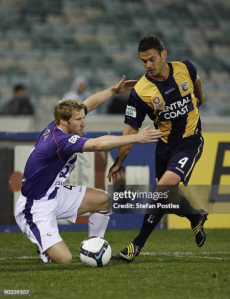 Pedj Bojic of the Mariners and Andy Todd of the Glory in action during the round five A-League match between the Central Coast Mariners ans the Perth...