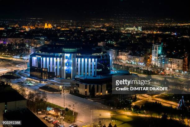 Picture taken through a window on January 10, 2018 shows a general view of the National Palace of Culture in Sofia, where the meetings of the Council...