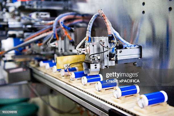 a li-ion battery production line. - batteries stock-fotos und bilder