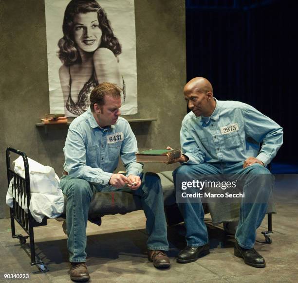 Actors Kevin Anderson and Reg E Cathey perform during a photocall for "The Shawshank Redemption" at Wyndhams Theatre on September 4, 2009 in London,...