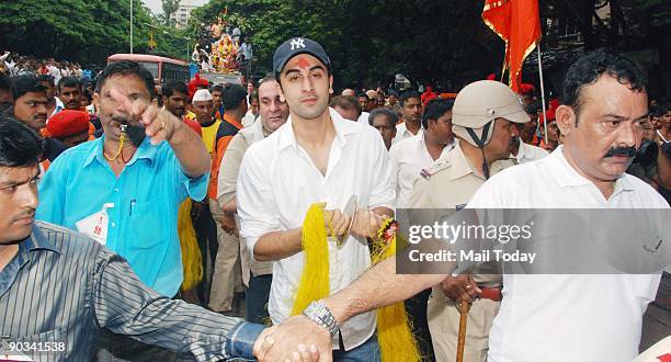 Bollywood actor Ranbir Kapoor joins the Ganpati Visarjan procession outside RK Studioin Mumbai on the final day of the Ganesh festival on Thursday,...