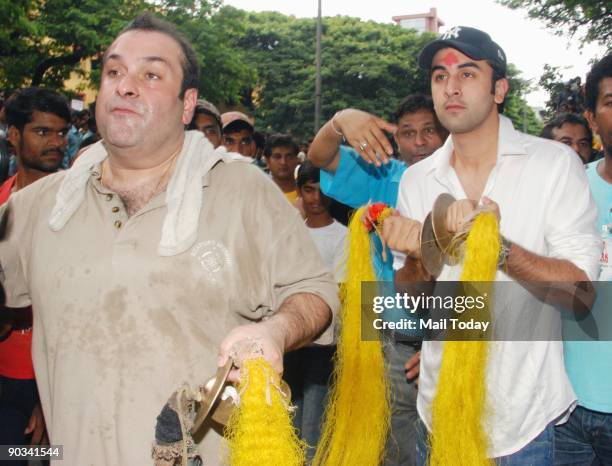 Bollywood actor Ranbir Kapoor with his uncle Rajeev Kapoor at the Ganpati Visarjan procession outside RK Studio in Mumbai on the final day of the...
