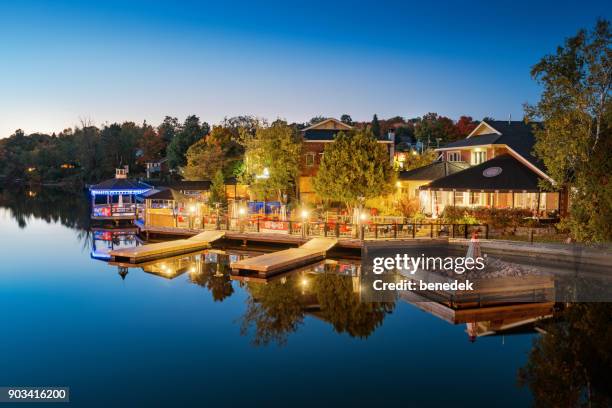 muskoka riverside restaurants in downtown huntsville ontario canada - muskoka stock pictures, royalty-free photos & images