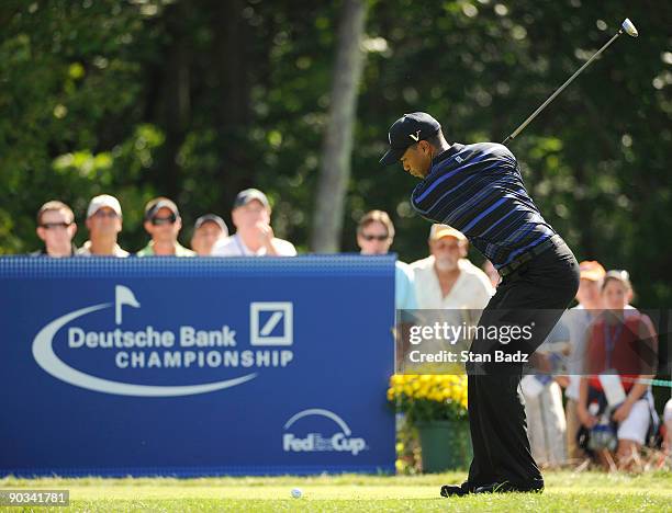 Tiger Woods hits from the 17th tee box during the first round of the Deutsche Bank Championship held at TPC Boston on September 4, 2009 in Norton,...