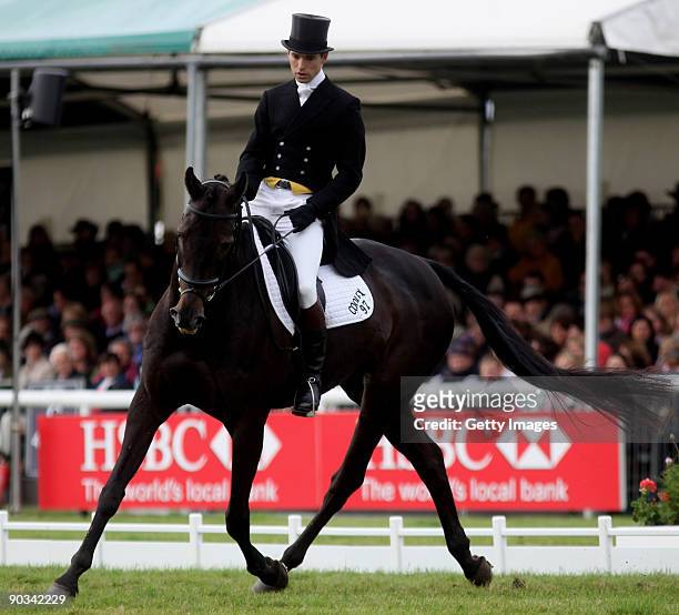 Harry Meade of Great Britain rides Midnight Dazzler during the Dressage at The Land Rover Burghley Horse Trials in the HSBC FEI Classics Series on...