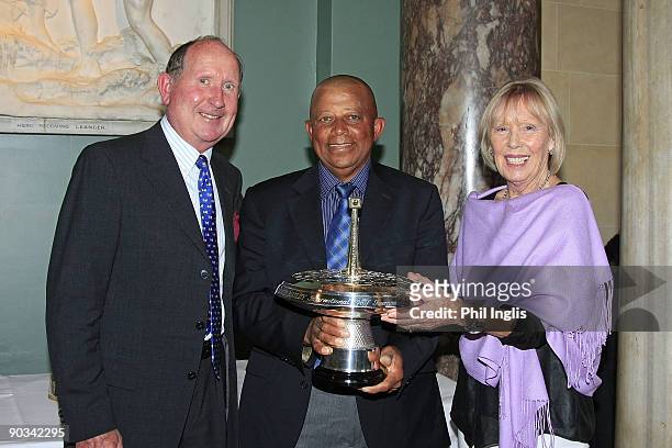 Ian Jerry Bruner of US is presented with the Lawrence Batley Award by Rita Firth and husband at the Annual Awards Dinner held at Woburn Abbey prior...