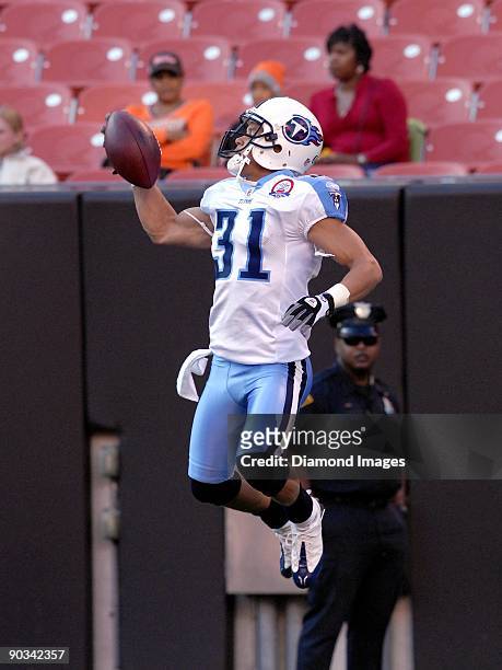 Defensive back Cortland Finnegan of the Tennessee Titans catches a pass prior to a preseason game on August 29, 2009 against the Cleveland Browns at...