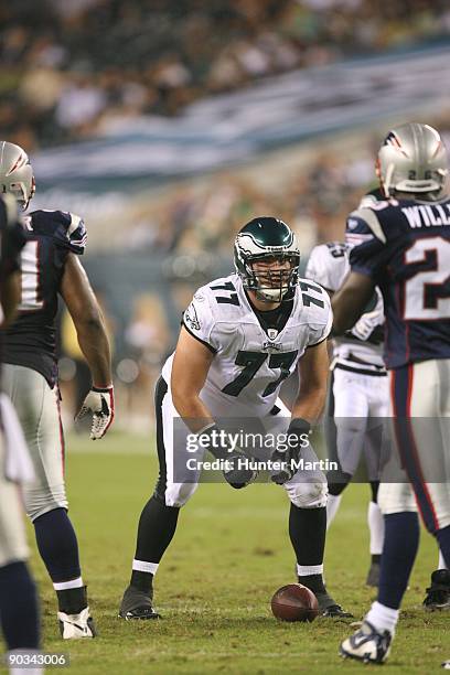 Guard Mike McGlynn of the Philadelphia Eagles sets in position at the line of scrimmage during a game against the New England Patriots on August 13,...