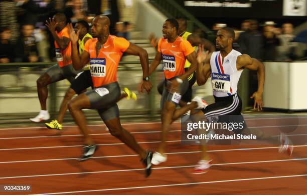 Asafa Powell of Jamaica and Tyson Gay of USA compete in the Mens 100m during the IAAF Golden League Memorial Van Damme meet at the King Baudouin...