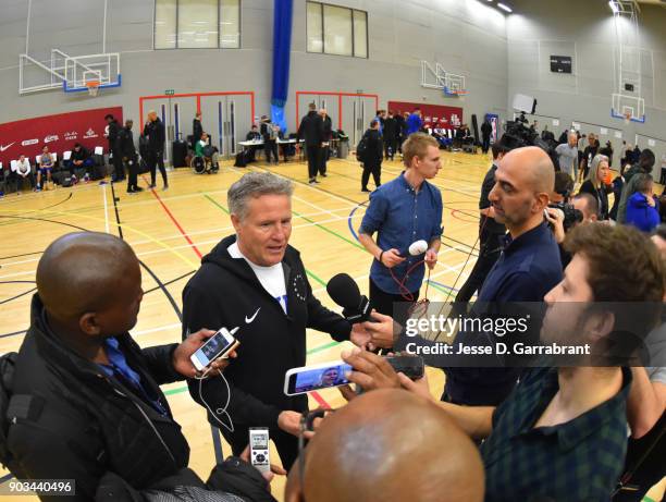 Head Coach Brett Brown of the Philadelphia 76ers talks to the media during practice as part of the 2018 NBA London Global Game at Citysport on...