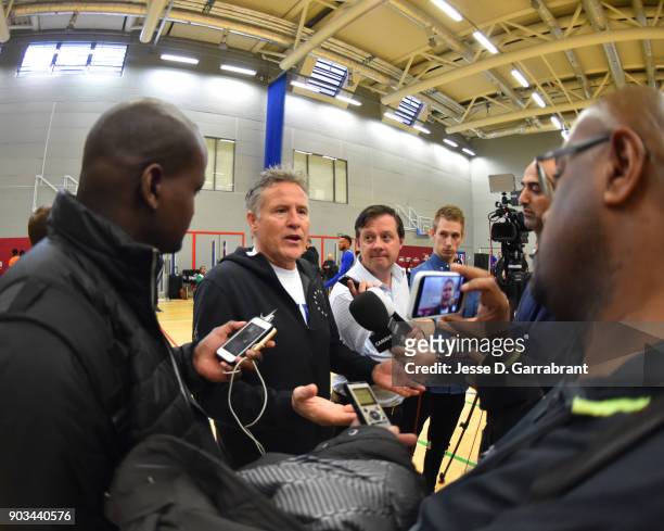 Head Coach Brett Brown of the Philadelphia 76ers talks to the media during practice as part of the 2018 NBA London Global Game at Citysport on...