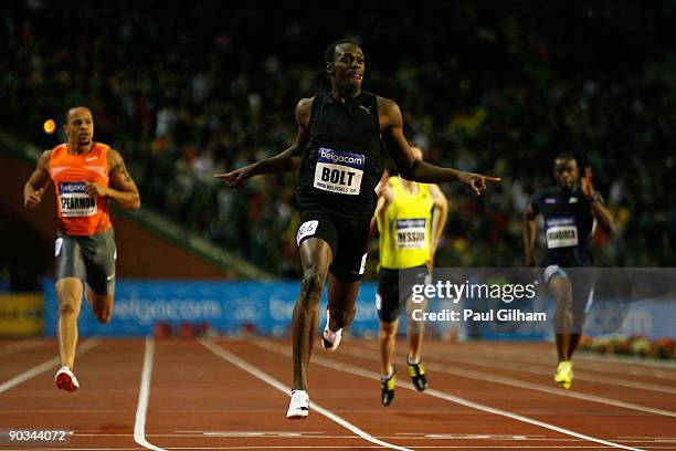 Usain Bolt of Jamaica celebrates as he crosses the finish line to take the victory in the Mens 200m during the IAAF Golden League Memorial Van Damme...