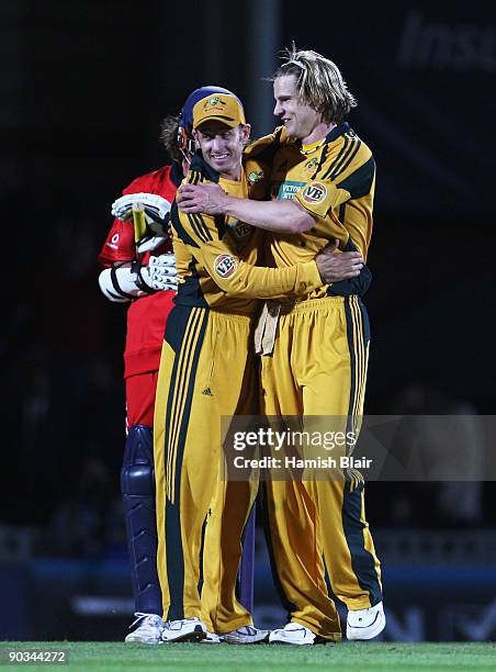 Nathan Bracken of Australia celebrates victory with Michael Hussey during the 1st NatWest One Day International between England and Australia at The...