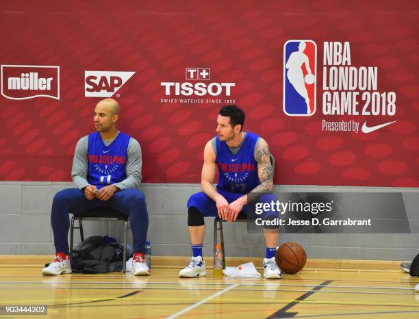 Jerryd Bayless and JJ Redick of the Philadelphia 76ers look on during practice as part of the 2018 NBA London Global Game at Citysport on January 10,...