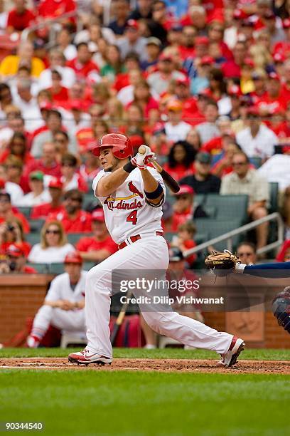 Yadier Molina of the St. Louis Cardinals bats against the Washington Nationals on August 30, 2009 at Busch Stadium in St. Louis, Missouri. The...