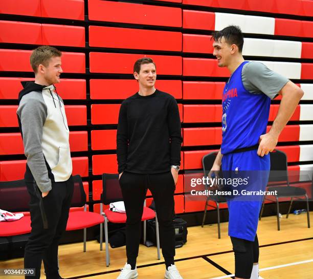 Dario Saric of the Philadelphia 76ers speaks with members of the tottenham football club during practice as part of the 2018 NBA London Global Game...