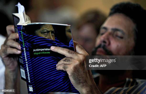 Cuba's Minister of Culture Abel Prieto reads UN General Assembly´s president, Nicaraguan Miguel D'Escoto´s book "Anti-Imperialism and Nonviolence" in...