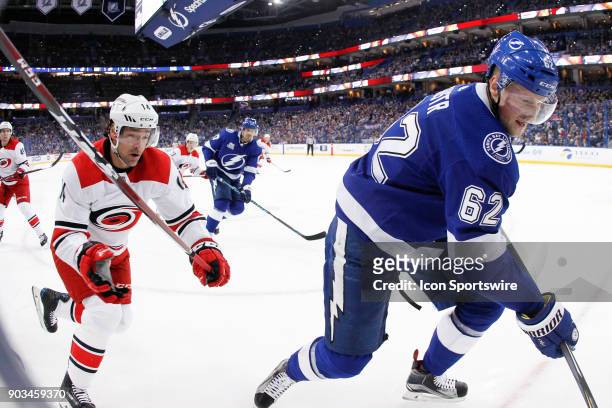 Carolina Hurricanes right wing Justin Williams and Tampa Bay Lightning defenseman Andrej Sustr in action in the first period of the NHL game between...