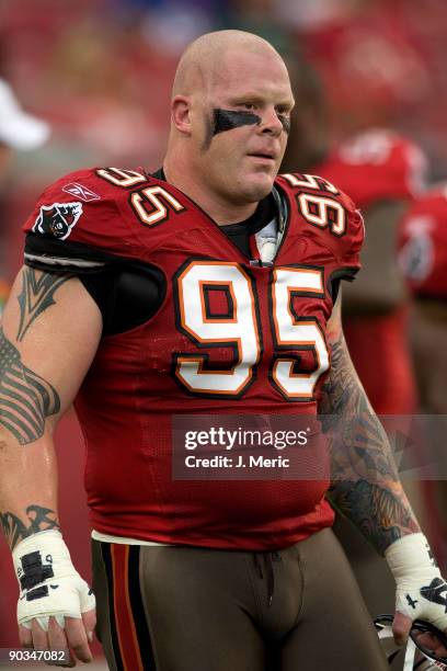 Defensive tackle Chris Hovan of the Tampa Bay Buccaneers is introduced just prior to the start of the preseason game against the Houston Texans at...