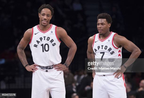 DeMar DeRozan and Kyle Lowry of the Toronto Raptors during the game against the Brooklyn Nets at Barclays Center on January 08, 2018 in Brooklyn, New...