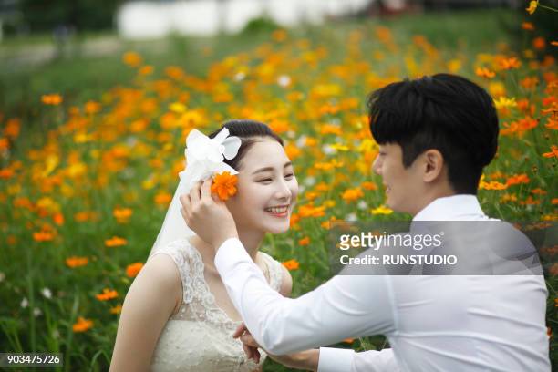 129 Putting Flower In Hair Photos and Premium High Res Pictures - Getty  Images