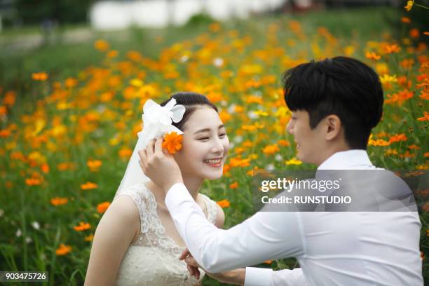 129 Putting Flower In Hair Photos and Premium High Res Pictures - Getty Images 129 Putting Flower In Hair Photos and Premium High Res Pictures - Getty Images