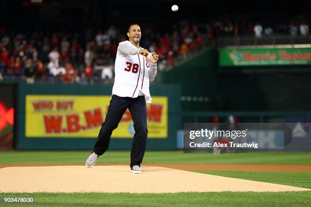 Former Nationals outfield Michael Morse throws out the ceremonial first pitch ahead of Game 5 of the National League Division Series between the...