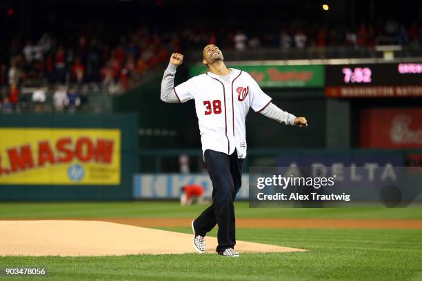 Former Nationals outfield Michael Morse throws out the ceremonial first pitch ahead of Game 5 of the National League Division Series between the...