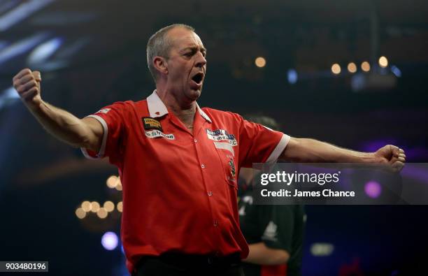 Wayne Warren of Wales celebrates victory during Day Four of the BDO World Darts Championship at Lakeside Shopping Centre on January 10, 2018 in...