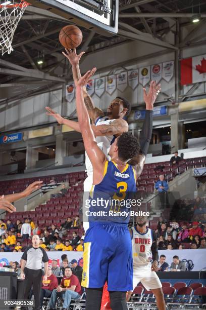 McDaniels of the Grand Rapids Drive drives to the basket and shoots the ball against the Santa Cruz Warriors during the NBA G-League Showcase on...