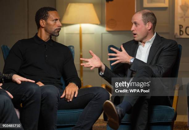 Rio Ferdinand and Prince William, Duke of Cambridge speak during a visit to meet staff, volunteers, and supporters of 'Campaign Against Living...