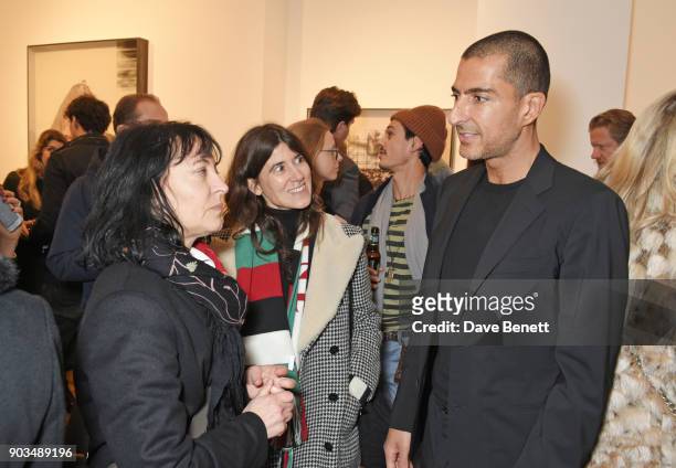 Karma Nabulsi, Bella Freud and Wissam Al Mana attend the private view of "JR: Giants - Body of Work" at Lazinc on January 10, 2018 in London, England.