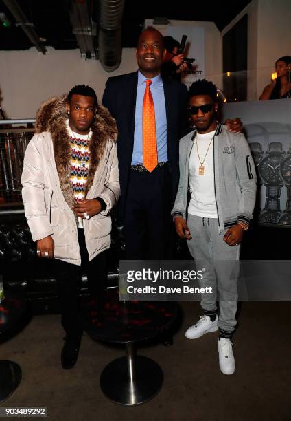 Ash Kirnon, Dikembe Mutombo and Lucas Henry attend The Tissot x NBA Launch Party at BEAT on January 10, 2018 in London, England.